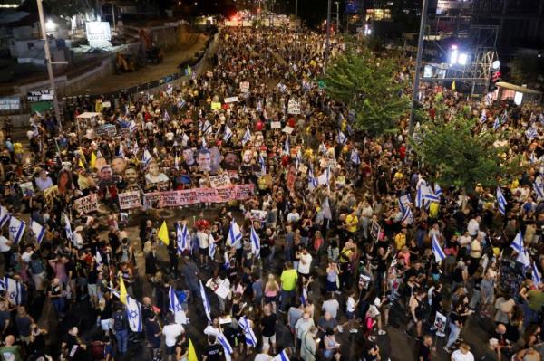 People attend a protest over captives in Gaza in Tel Aviv